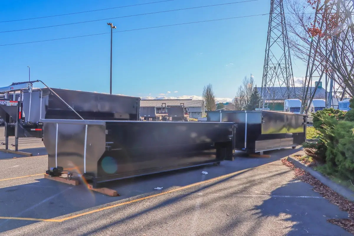Roll-off dumpster ready for waste disposal at job site for 2 Yard Dumpster Rental in Ferguson